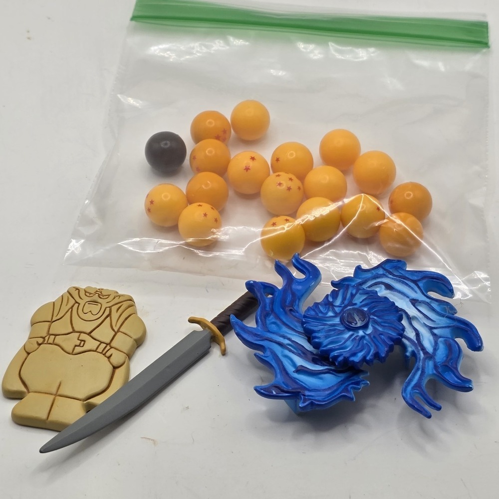 Set of 17 Dragon Ball Z Small Yellow Star Balls with DBZ Dabura Cookie 2" & Etc